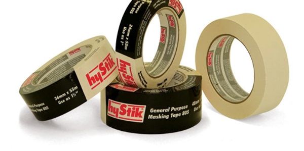 Four rolls of HyStik masking tape in black and beige colors.