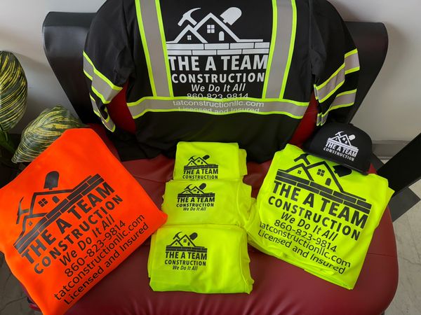 Construction team apparel with logo and contact info.