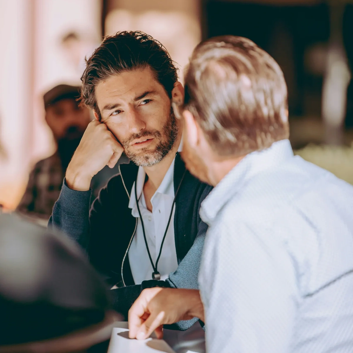 Men talking in business context