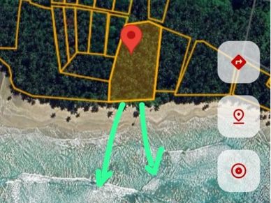 Map showing a marked land plot near a beach.