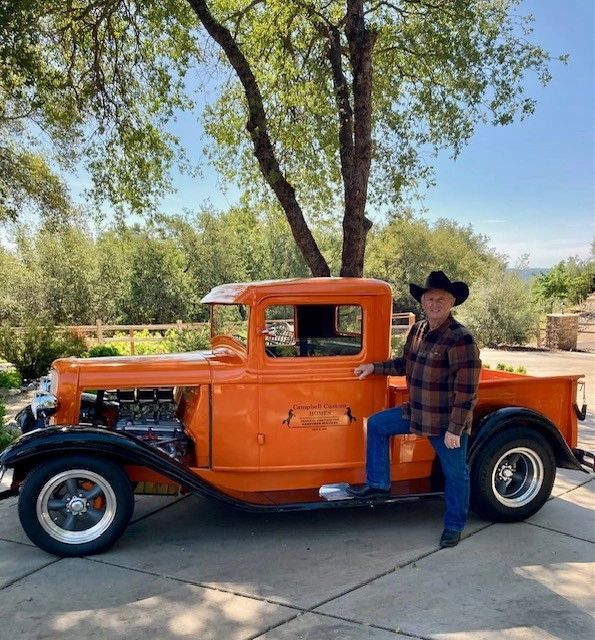 roy and orange truck.jpg