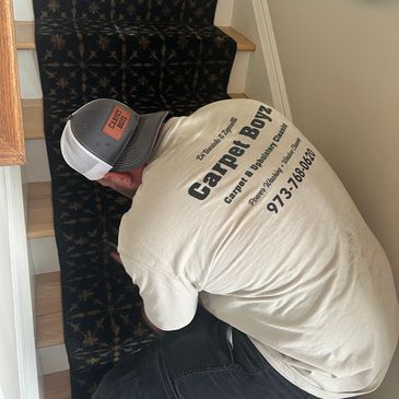 Mark cleaning the stairs