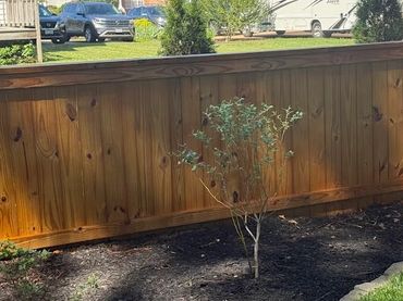 New fence sealing with honey-gold water sealant color in Mechanicsville, VA by southernhomedeck.com