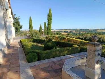 French garden with octagon fountain 