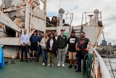 Students on the well deck of the Cape Don.