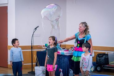 Interactive bubble activity in school event.