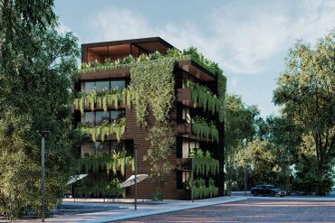 Edificio moderno con muchas plantas en las fachadas.