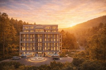 Hotel grande en un paisaje natural al atardecer.