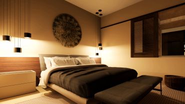 Dormitorio moderno con iluminación cálida.