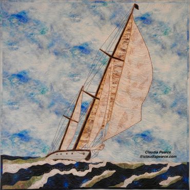 Scene of a ketch in choppy seas with the sails billowing out. 