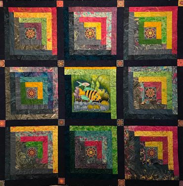 Un-traditional log cabin quilt.