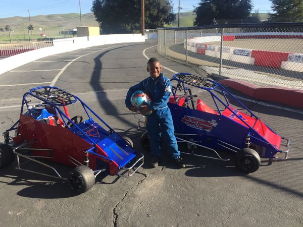 Cam Carraway racing his quarter midget cars.