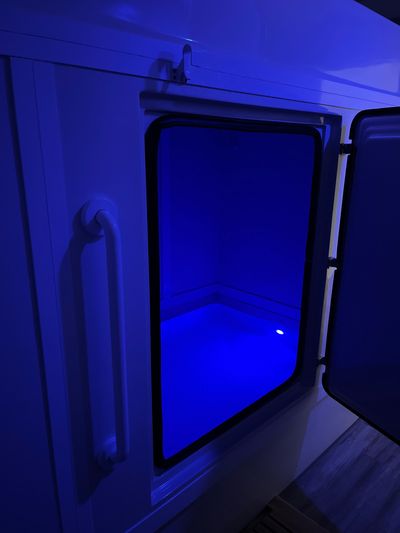 Float cabin with light blue light shining 