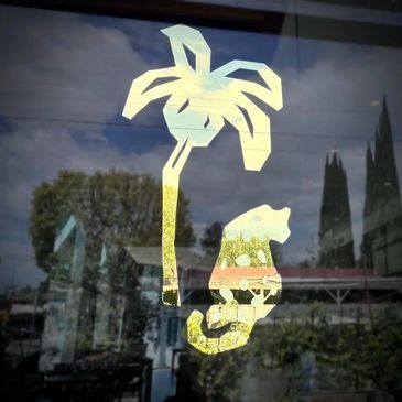 23k gold water gilded logo 10k lemon gold infill spots for Leopardo restaurant in LA sign painter