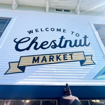 Hand painted storefront sign Chestnut Market Long Beach Los Angeles sign painter hand painted
