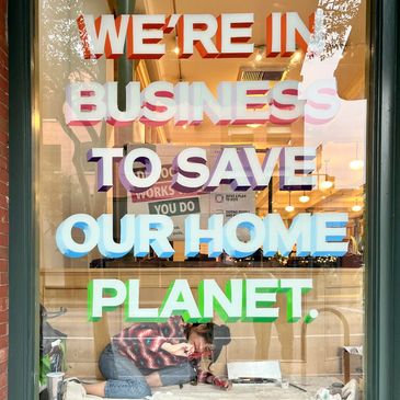 Custom hand-painted signage for Patagonia Pasadena + Santa Monica  Windows, walls, transom numbers a