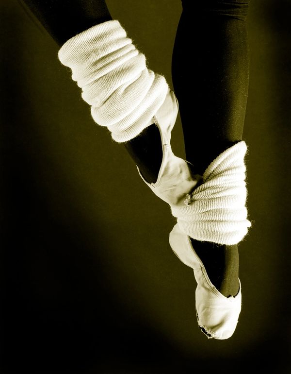 Ballet warm-ups.  Image shot in B&W, medium format.  Printed in Darkroom on B&W and then toned durin
