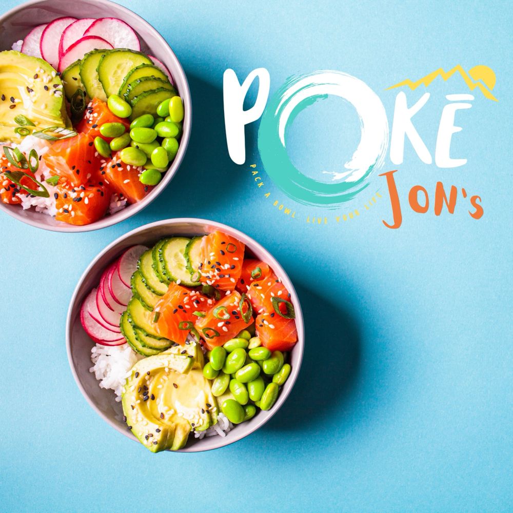 Two colorful poke bowls with fresh salmon, avocado, cucumber, radish, and edamame on a blue background.