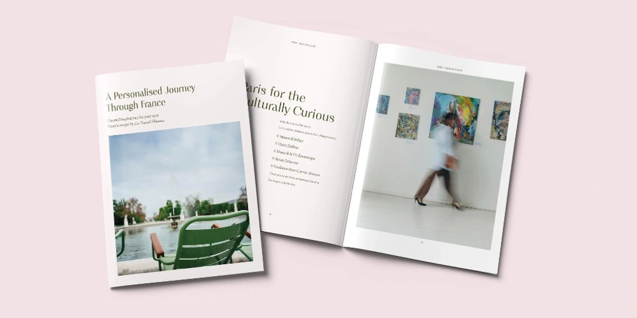 Travel magazine opened to a feature on Paris and art galleries.