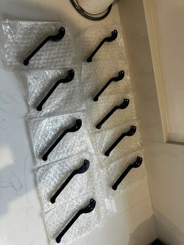Completed Brake Levers returned from Anodise & ready to ship to customer after quality checks