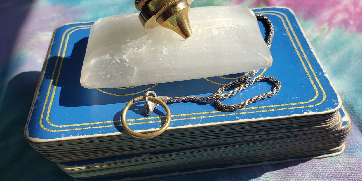 Cards and Copper Pendulum on Selenite Slab