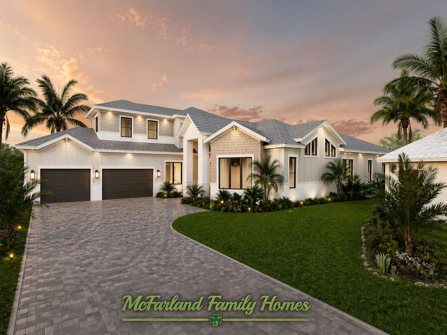 Modern two-story home with a three-car garage and lush landscaping at sunset.