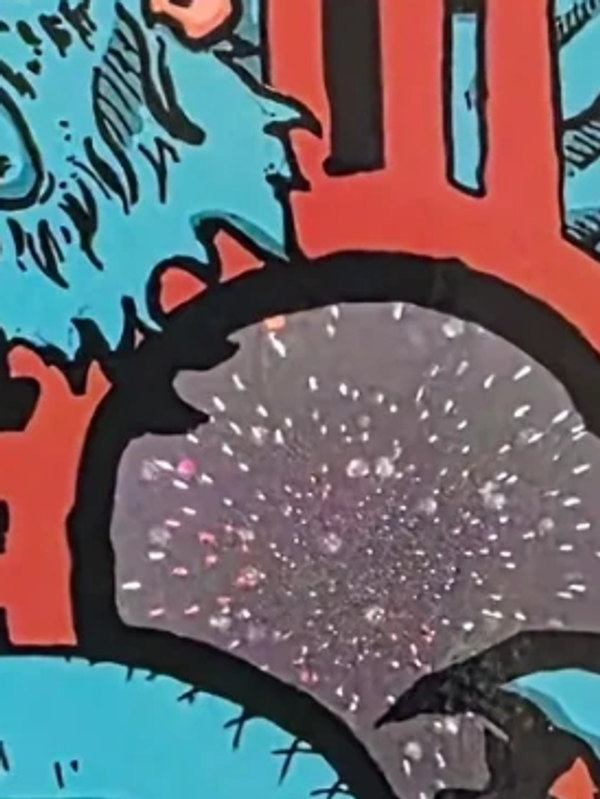 Abstract colorful graffiti with blue, red, and sparkling gray elements.