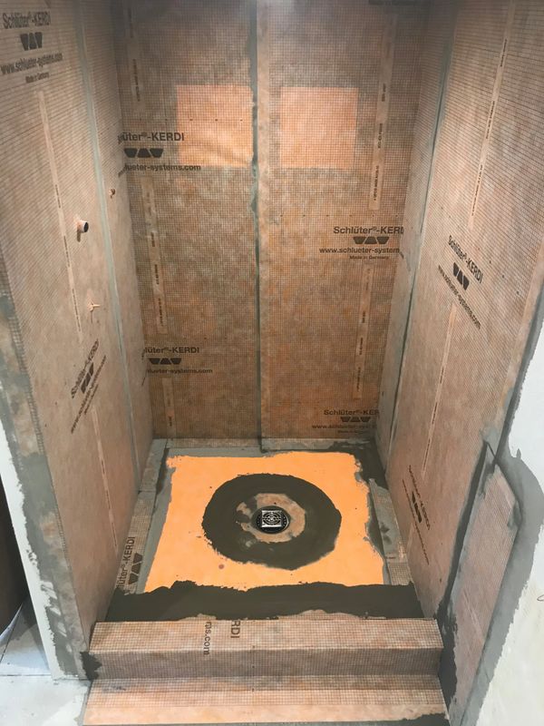 SCHLUTER SYSTEMS WATERPROOF MEMBRANE AND SHOWER PAN INSTALL