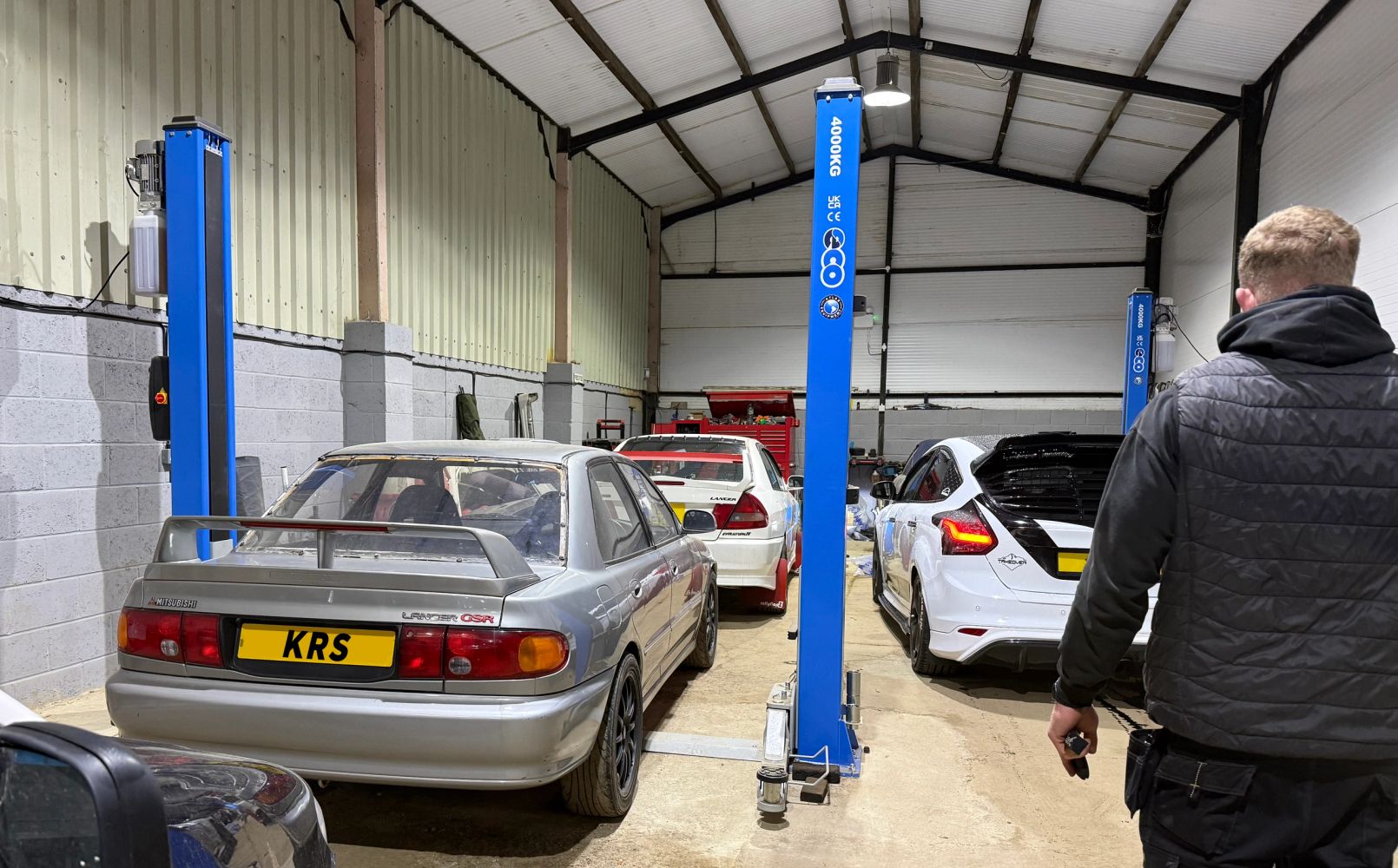 Ringstead garage, Denford road workshop, evo 4, evo 2, focus ST, blue car ramp. 