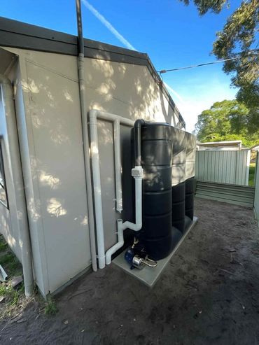 Rain water tank and pump installed at Woy Woy