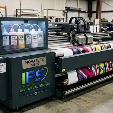 Industrial printer producing vibrant, colorful prints on large material rolls.