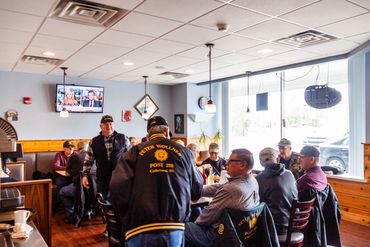 A group of people at a table for meal