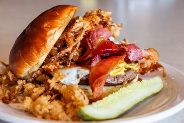 closeup shot of delicious burger with beacon 