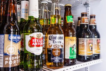 closeup shot of bottles of beverages 