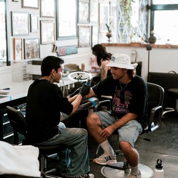 Adrian tattooing 