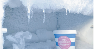 image of an iced freezer and a tub of ice cream #frozenfood