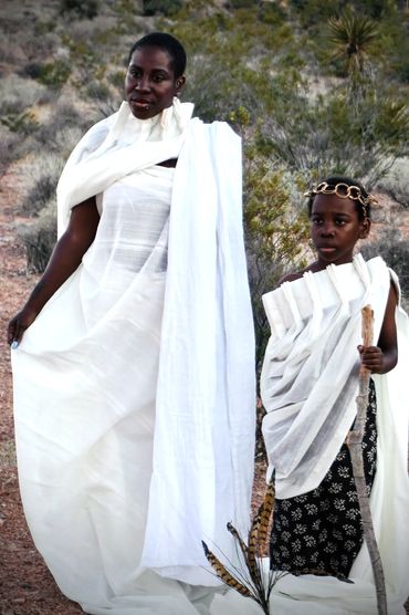 Desert woman and son in royal nomadic attire.