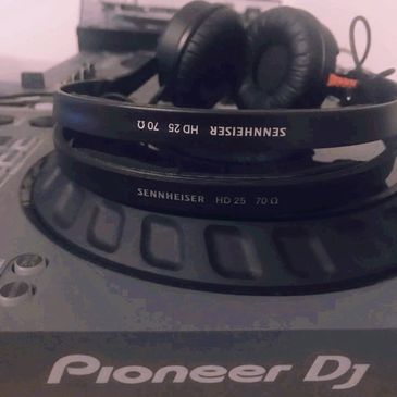 dj headphones on a pioneer dj controller