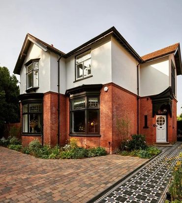 White thin coat render on a period property