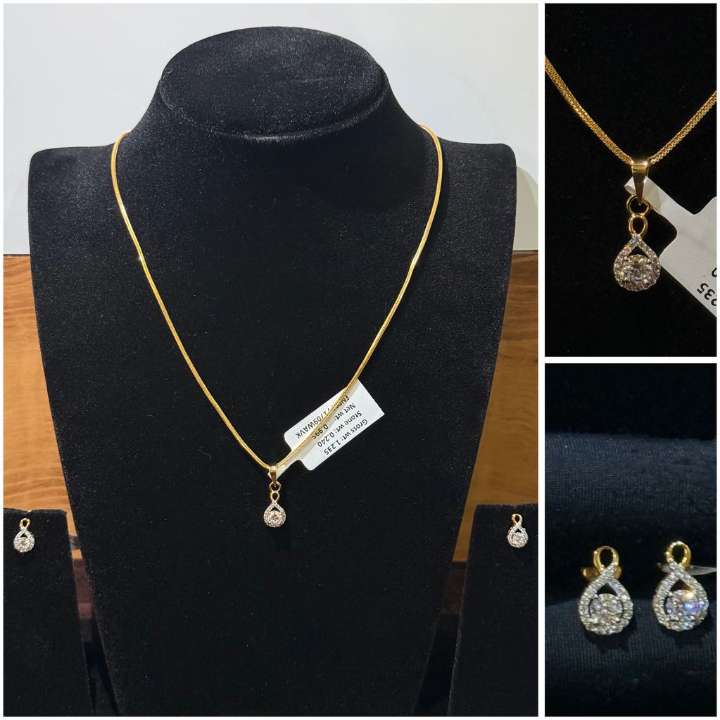 Gold necklace and earrings set with sparkling stones.