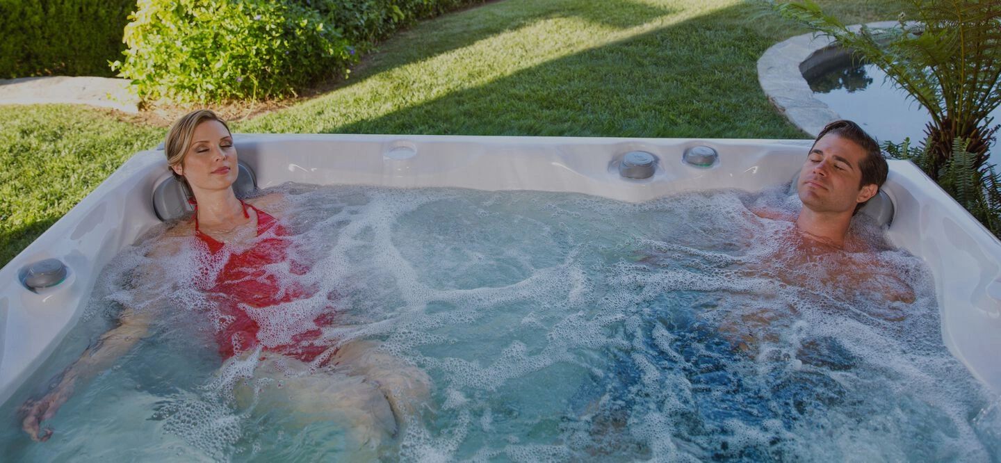 Man and Woman relaxing in a Sundance Spa