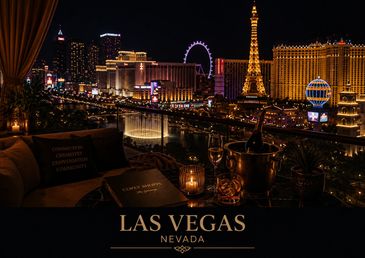 Night view of the illuminated Las Vegas Strip with Eiffel Tower replica.