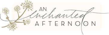 Elegant text design saying 'An Enchanted Afternoon' with floral accents.