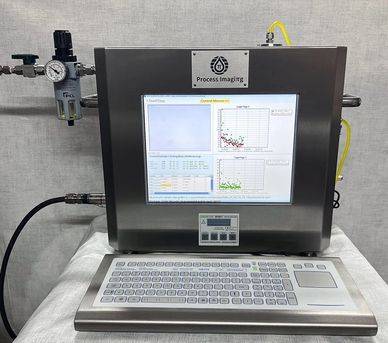 Industrial process imaging device with screen and keyboard setup.