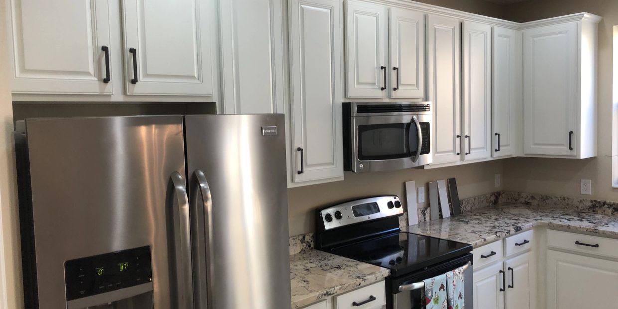 kitchen cabinets professionally painted white in lake mary fl 32827