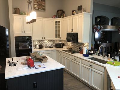 kitchen cabinets refinished painted white St Cloud Fl 34771