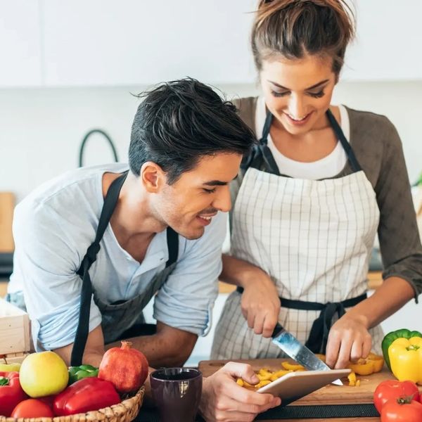 Couple preparing a meal for reproductive health