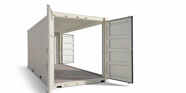 Open shipping container with doors wide open on both ends.