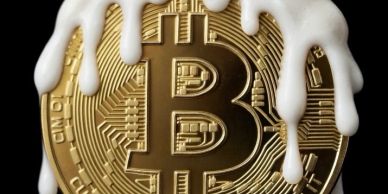 Bitcoin coin with melting white substance.