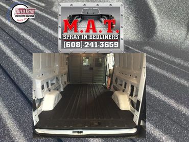 Van interior with spray-in bedliner coating.